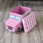 Caja rosa de almacenaje para niños